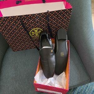 Size 11 Black Leather woman shoes. Never worn. Brand new with box .